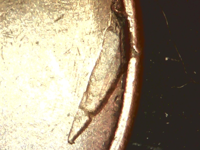 1909-S-VDB-Wheat-Cent-Delam-Or-Strike-Through