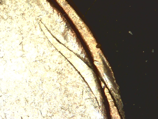 1970-D-Struck-Thru-Rim-Burr