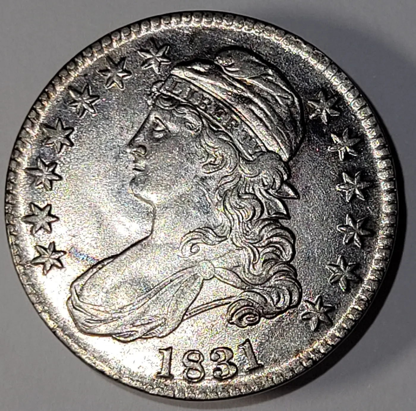Possible-1831-Counterfeit-Bust-Half