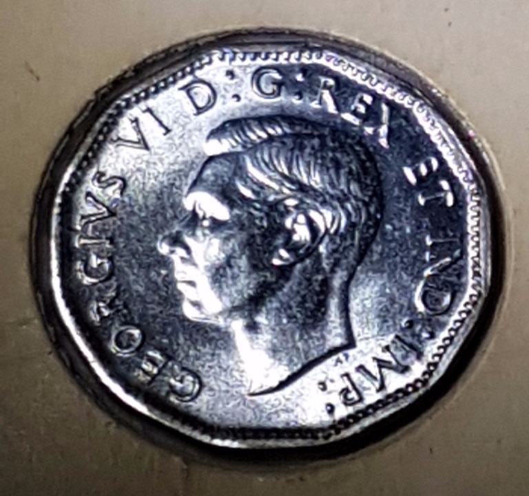 1944-And-1945-Canadian-Nickle...-Holder-Says-Bu-Unc?