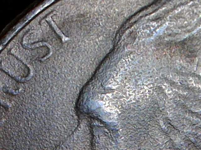 Metal-Question-On-A-1999-D-Nickel