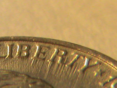 1994-P-Jefferson-Nickel-Feeder-Damage?