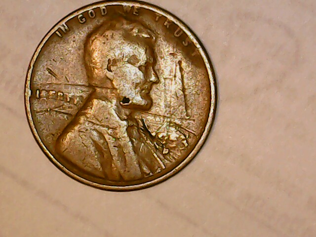 1953-Wheat-Penny-Looks-Damaged-But-Odd
