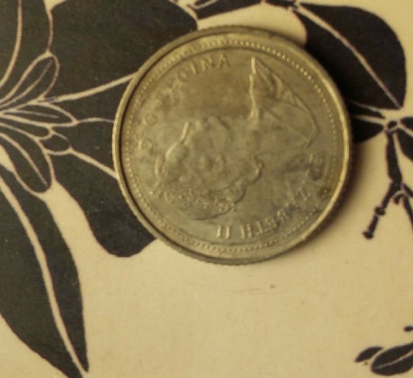 1986-10-Cent-Coin-With-Foreign-Errors