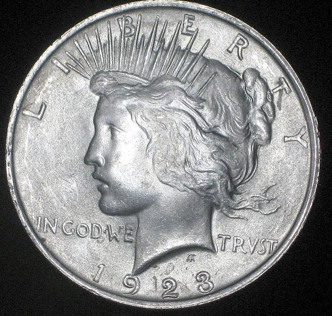 1923-P-Peace-Dollar-With-1993-Peace-Accord-Over-Stamp-On-Reverse