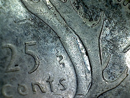 25c-1964-Could-This-Be-A-Rim-Strick?
