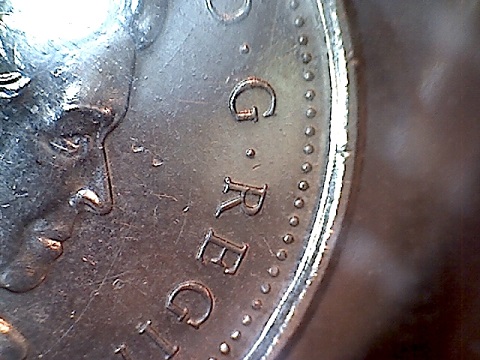 2010-Dime-Under-And-Overlap-On-Letter-R?