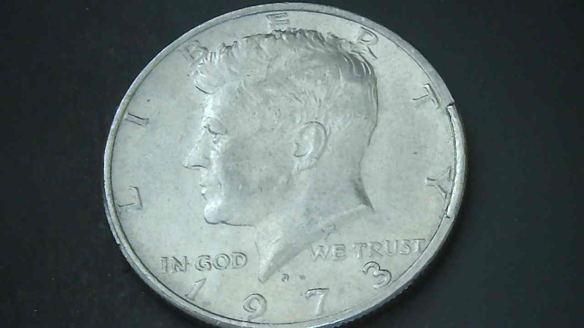 1973-D-Kennedy-Half-Dollar-With-Extra-Rim-Piece?