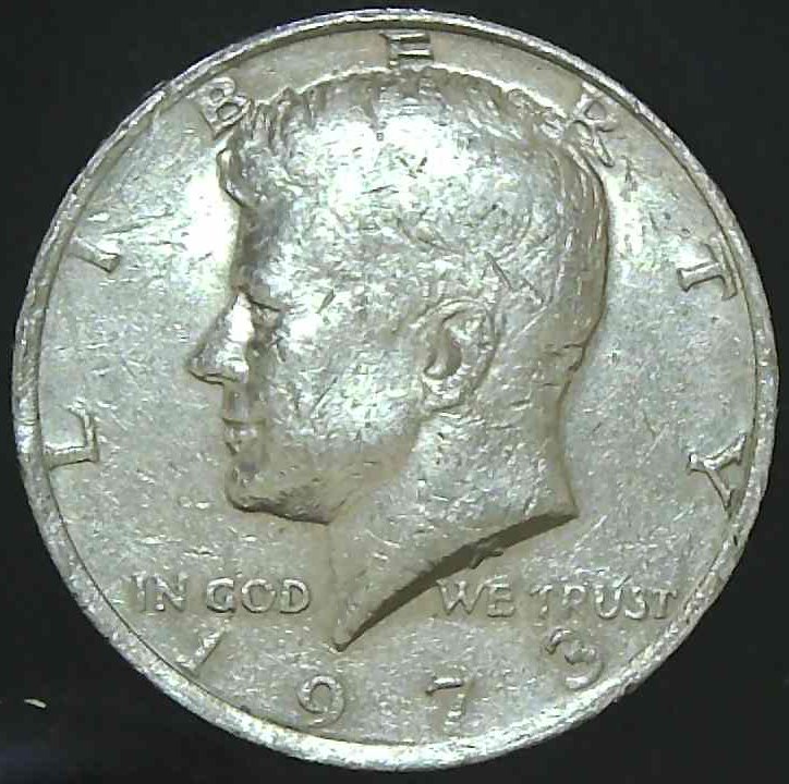 1973-Kennedy--Half-Dollar-Rim-Error-Or-PMD?