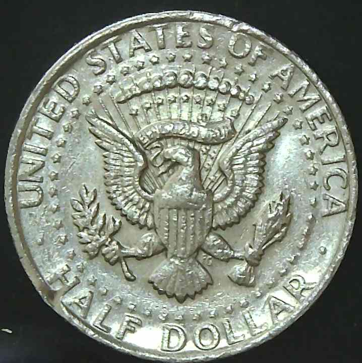 1973-Kennedy--Half-Dollar-Rim-Error-Or-PMD?