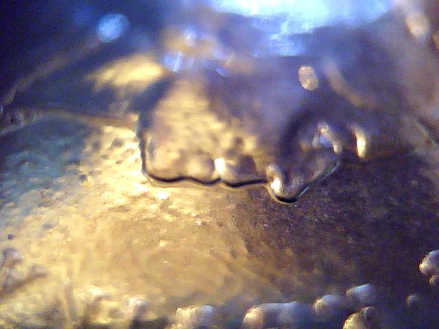 1998-CDN-Penny---Shiny-But-Bumpy-Surface,-What-Causes-This?