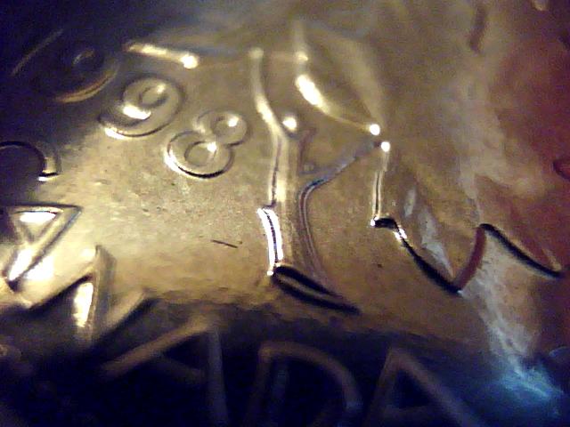 1998-CDN-Penny---Shiny-But-Bumpy-Surface,-What-Causes-This?