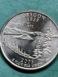 Unusual-Markings-On-BU-State-Quarters-From-Reserve-Rolls