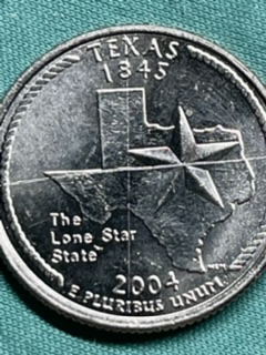 Unusual-Markings-On-BU-State-Quarters-From-Reserve-Rolls
