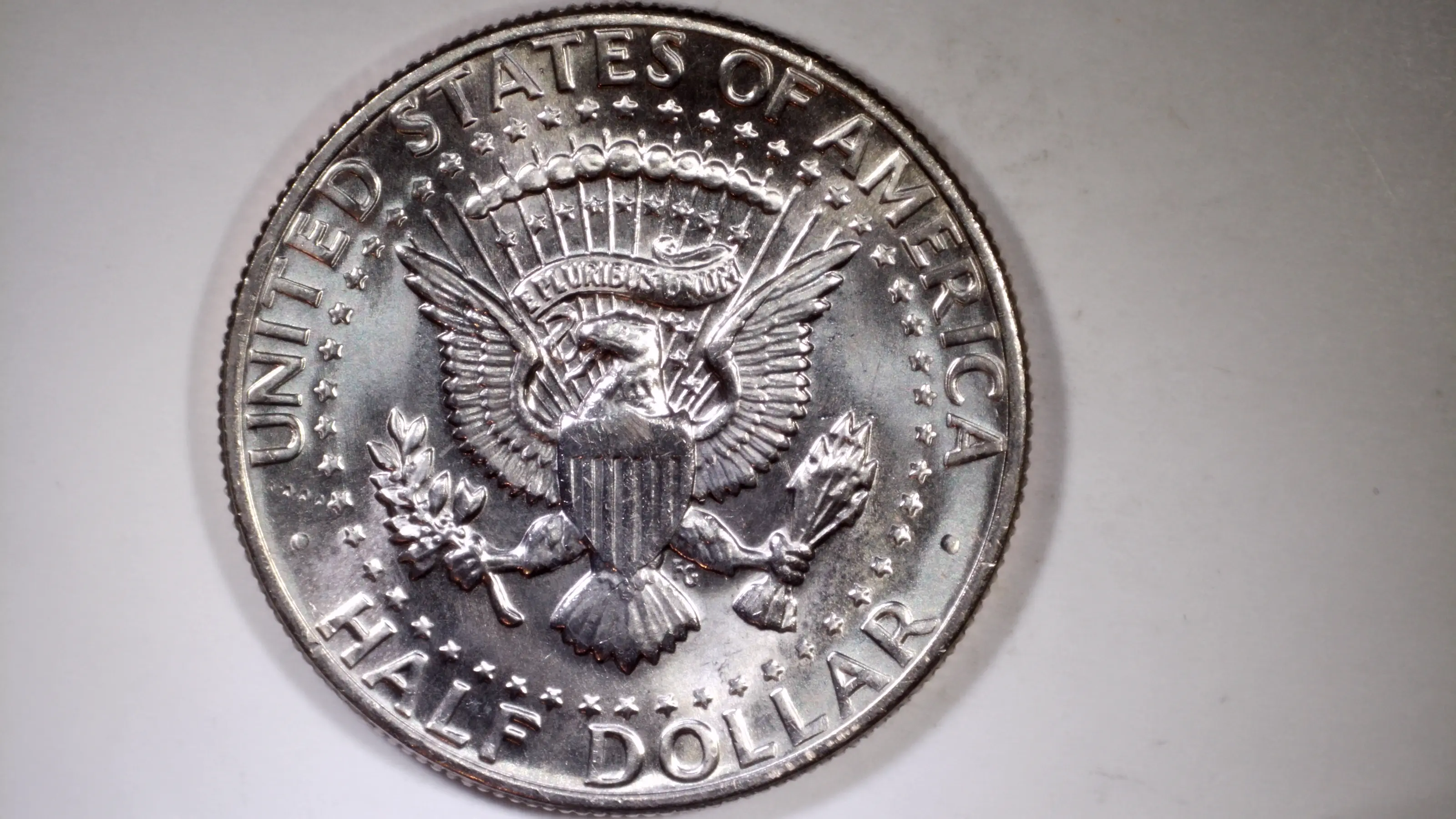 1977-D-Kennedy-Half-Dollar-Reverse-Lettering