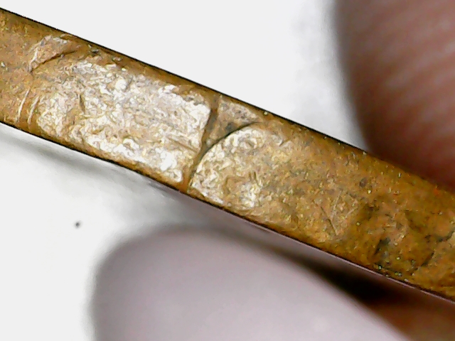 1909-Lincoln-Penny-With-Twisted-Rim,-Gas-Bubbles,-Multiple-Wheat-Stems