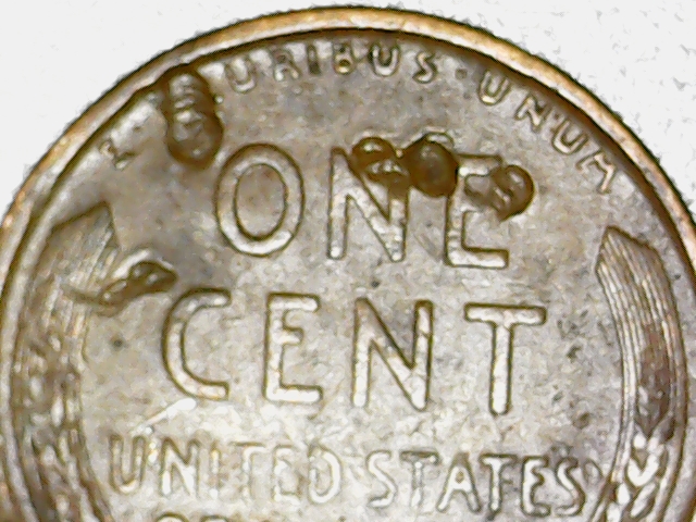1909-Lincoln-Penny-With-Twisted-Rim,-Gas-Bubbles,-Multiple-Wheat-Stems