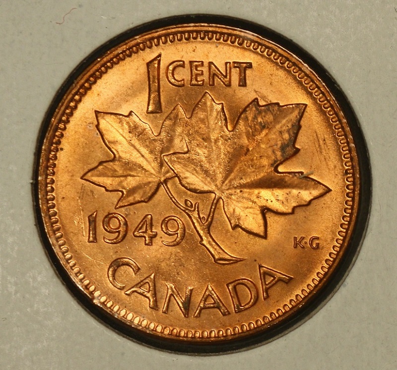 1949-Cent-With-A-Pointing-To-Denticles