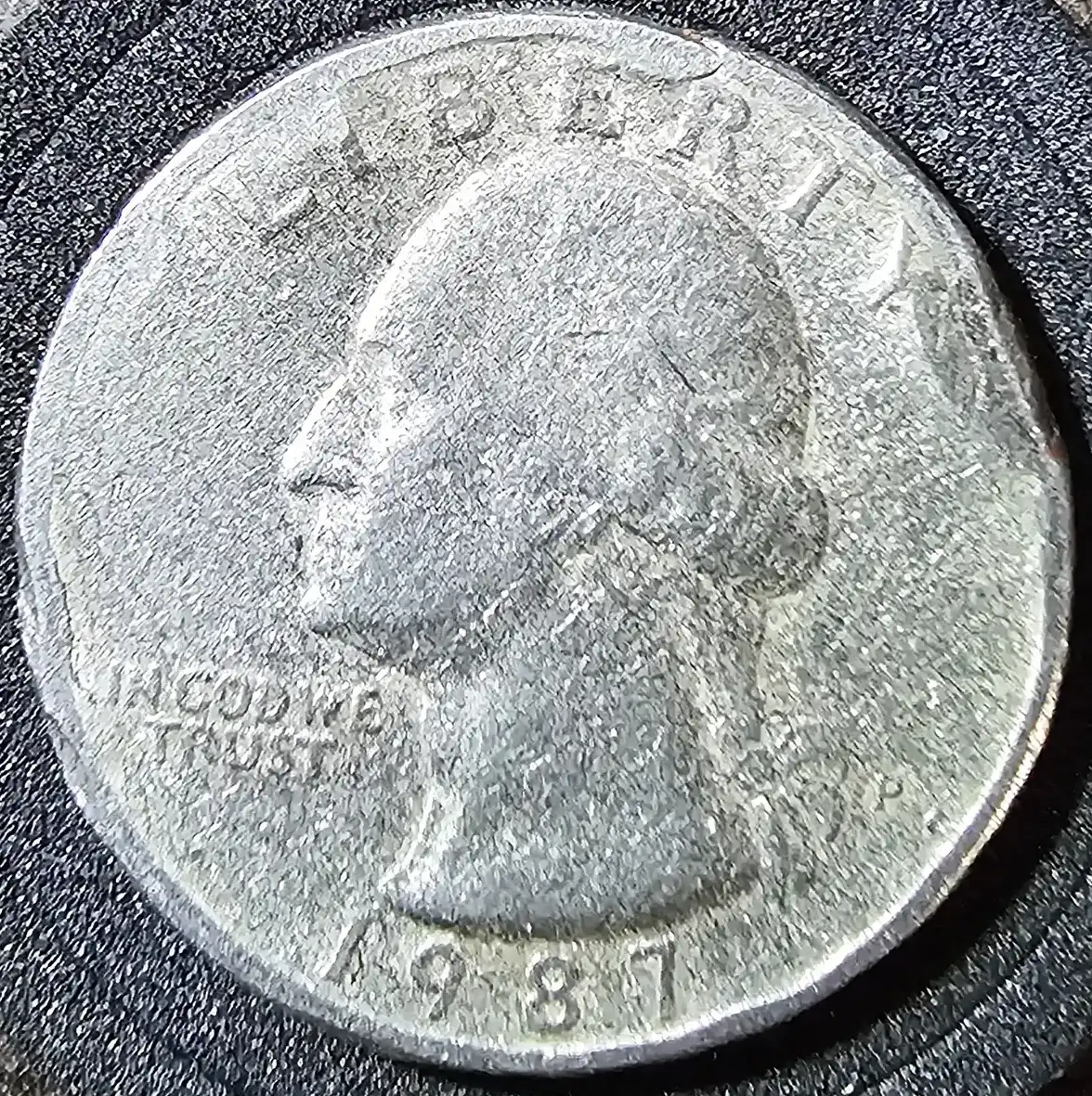 1987-P-Quarter-Die-Damage-Or-Human?