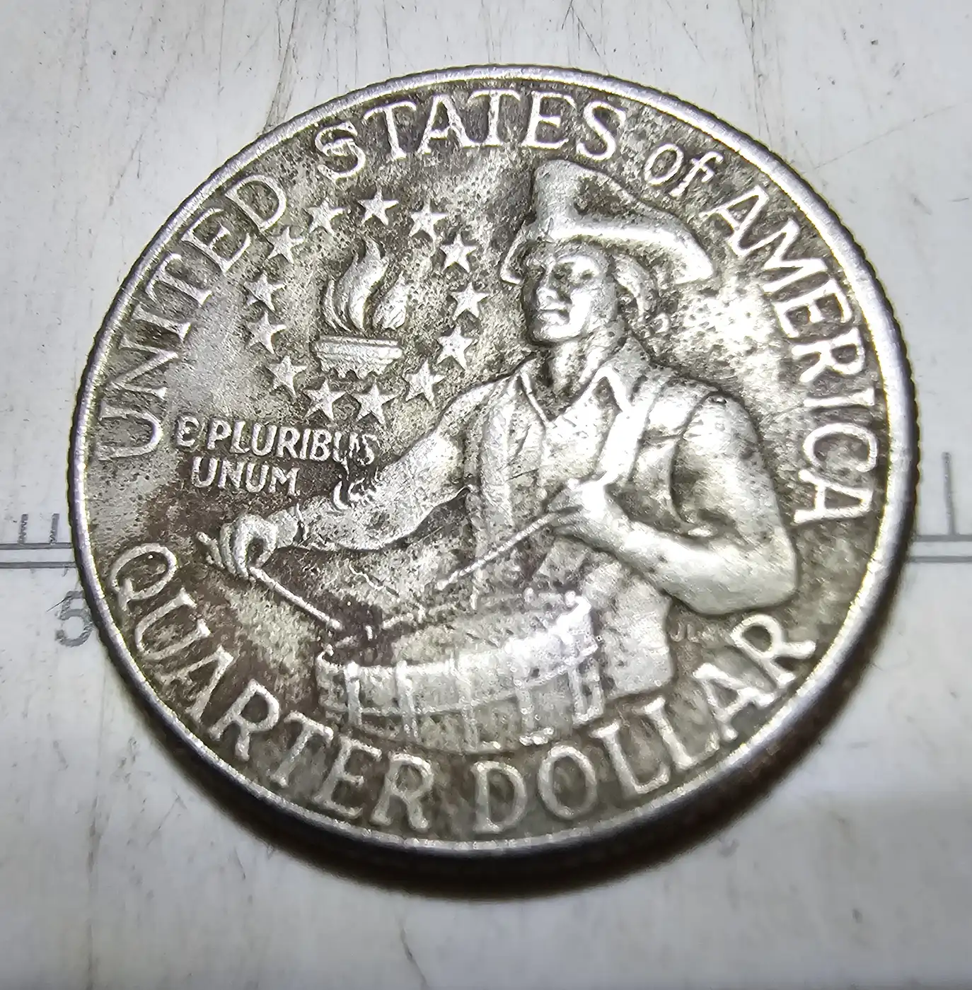 1976-Quarter-Filled-In-Mint-Mark,-Reverse-Drummers-Arm