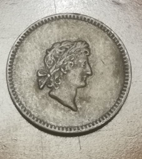 A-Small-Token-With-Letters-P.-G.