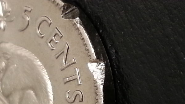 1942-BU-Nickel-With-Weird-Cuts-In-Rim