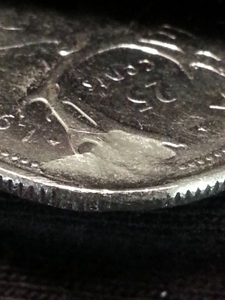 1995-25-Cent-Struck-Through-Or-Planchet-Flaw-Or-PMD?
