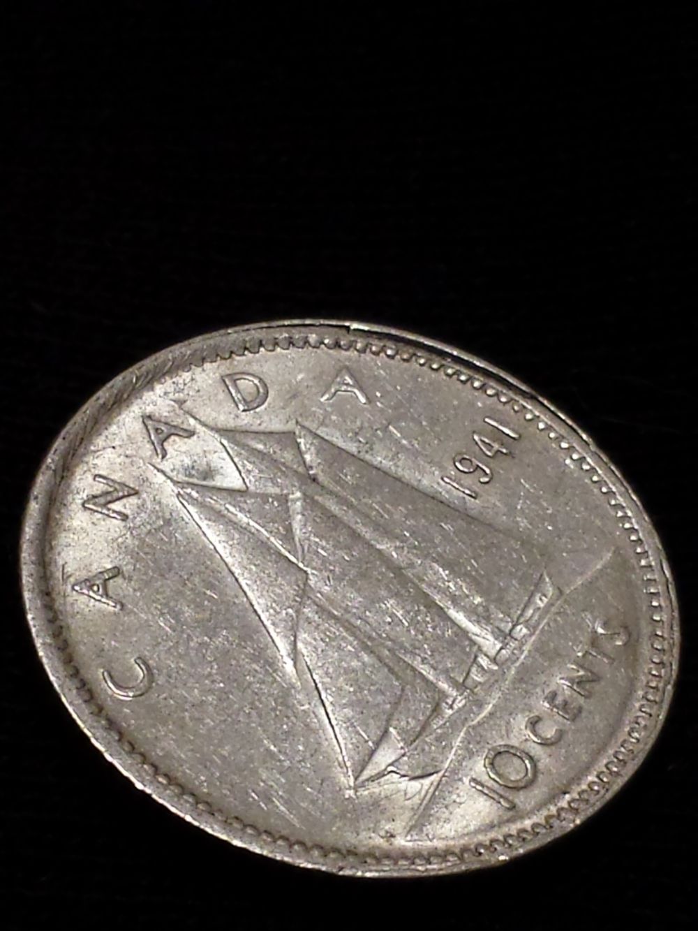 1941-10-Cent-With-Missing-Denticles-And-Raised-Rim