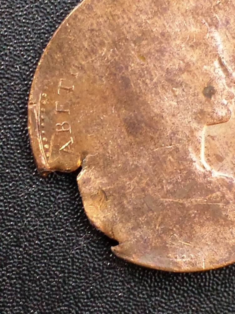 1975-1-Cent-Ragged-Clip-Split-Planchet?