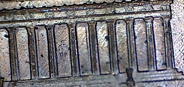 1994-LMC-Strange-Mark-Under-Lincoln-On-Back