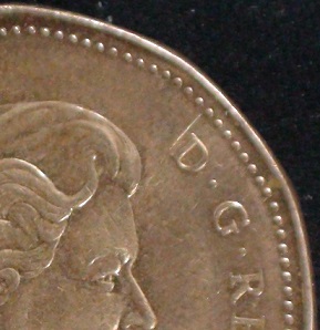 2009-Loonie-Double-Die-Plus-Crack-In-Coin
