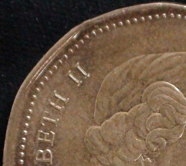 2009-Loonie-Double-Die-Plus-Crack-In-Coin