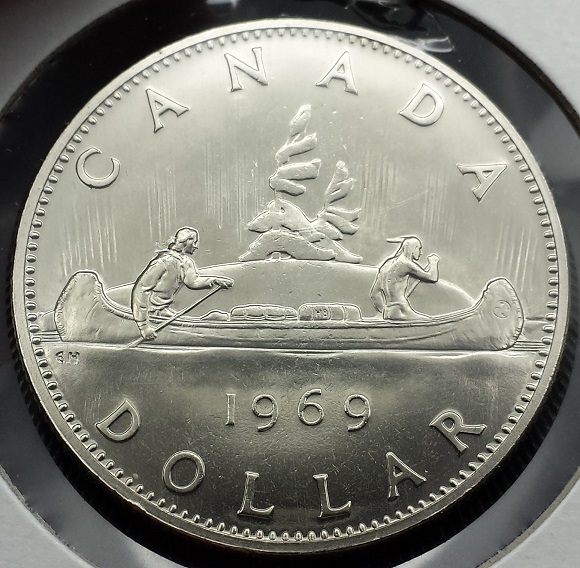 1969-Nickle-Dollar-Second-Paddler-Hand