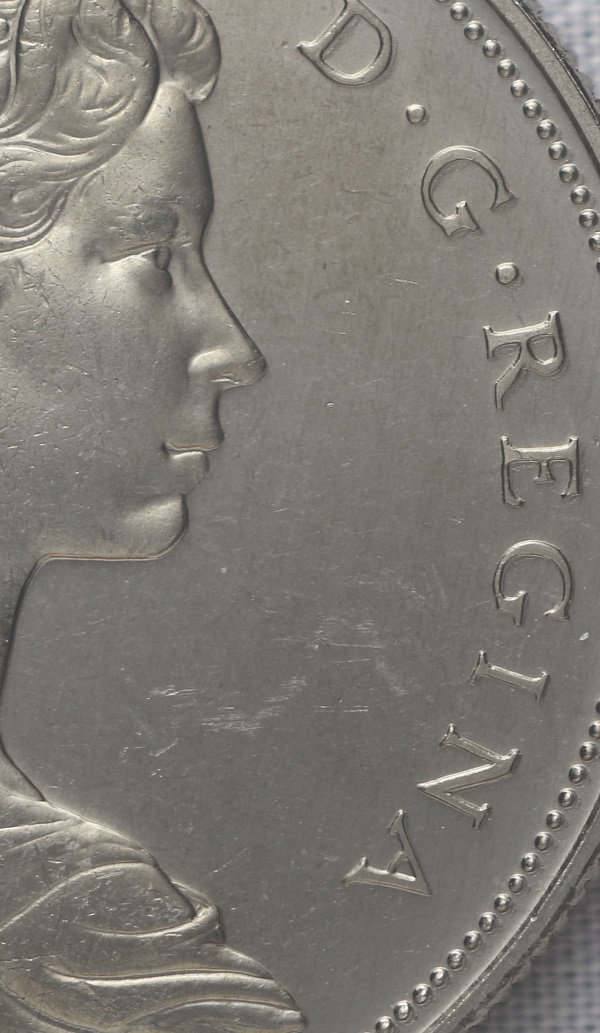1969-Canadian-Nickel-Dollar-Doubling-Obverse-And-Reverse