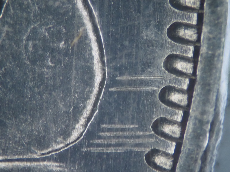 Is-The-1968-1$-Coin-A-Double-Horizon-Line-Variety?