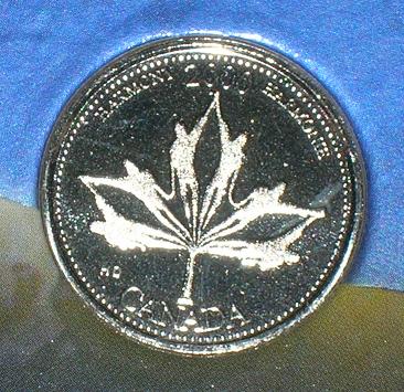 Coins-Inset-In-Mint-Collection