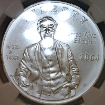 Green-Spot-On-A-Coin-Inside-A-PCGS/Ngc-Slab