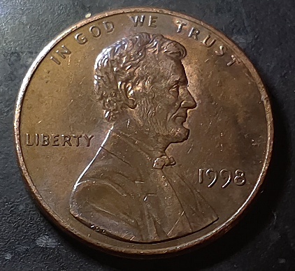 1998-Penny-Memorial-Is-Stamped-Multiple-Times-On-The-Reverse