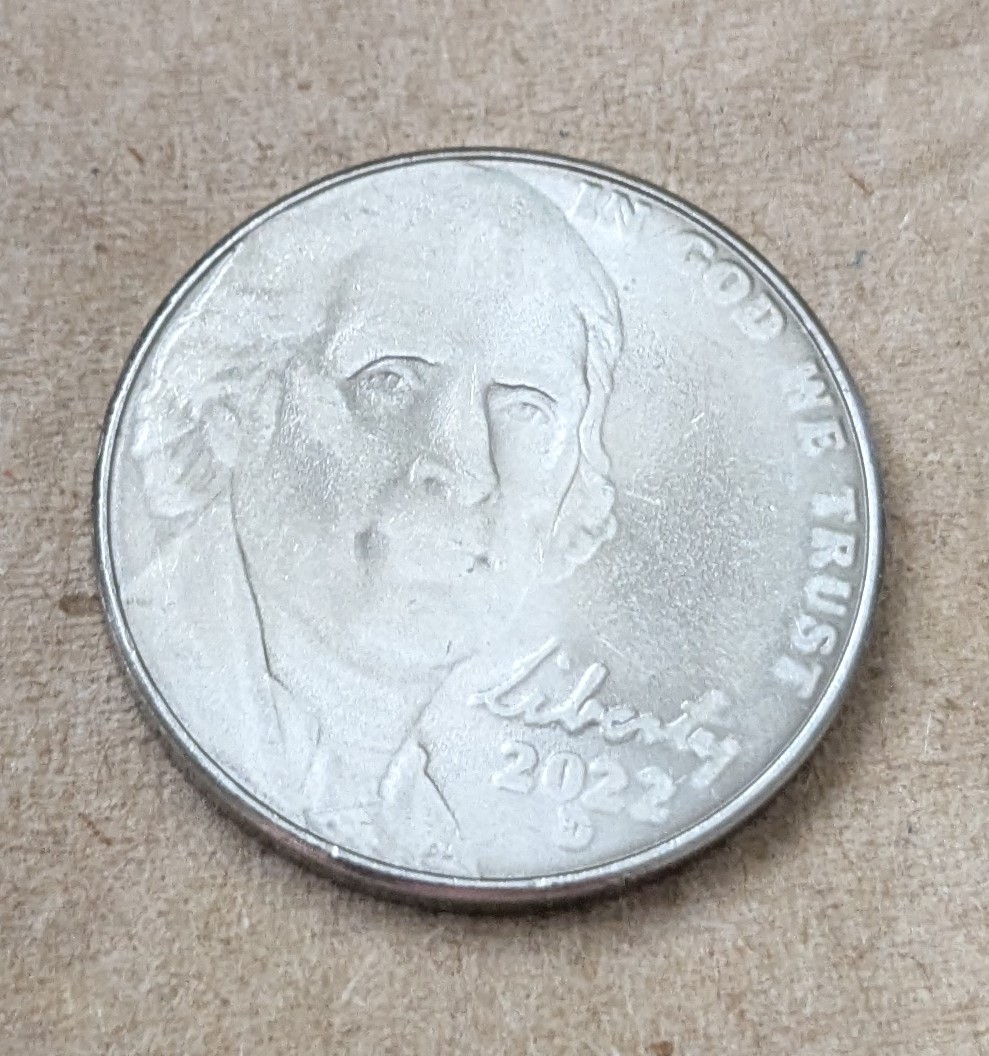 2022-D-Five-Cents.-Strike-Through-Grease?