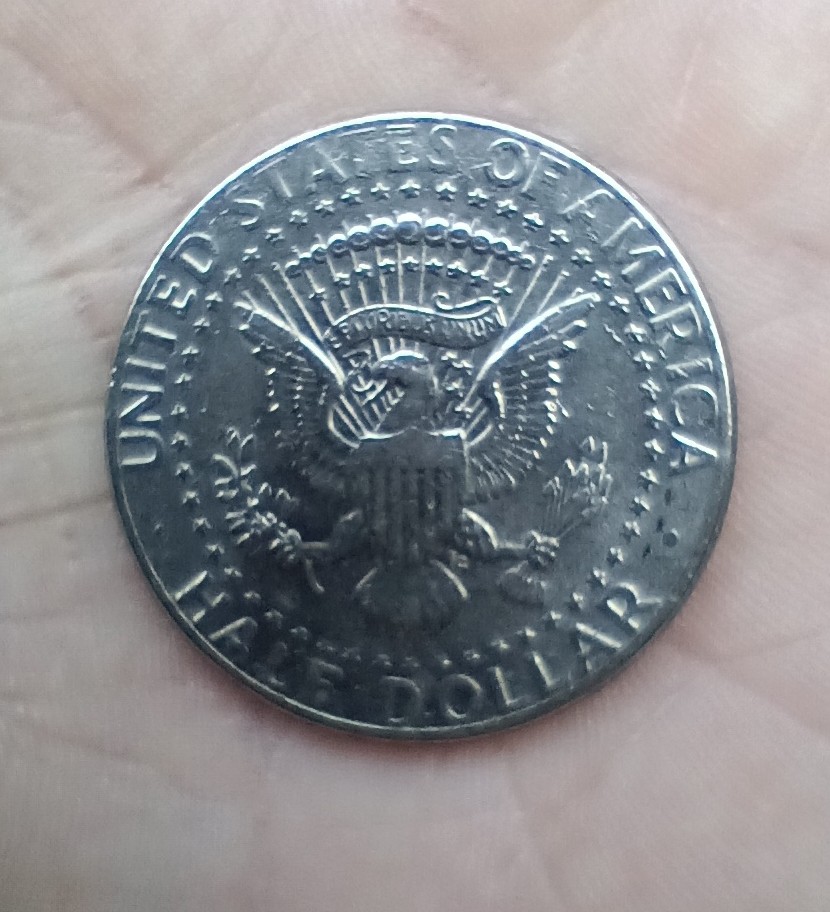 1994--P--Kennedy-Half-Dollar-It-Has-A-Ring-Around-The-Head-And-Doesn't-Have-A-Raised-Lip-Around-It
