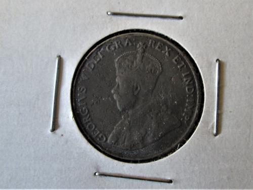 Near-Or-Far-6-On-This-Dug-5-Cent-Piece
