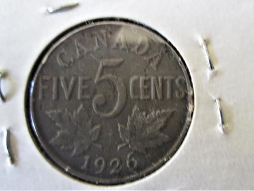 Near-Or-Far-6-On-This-Dug-5-Cent-Piece