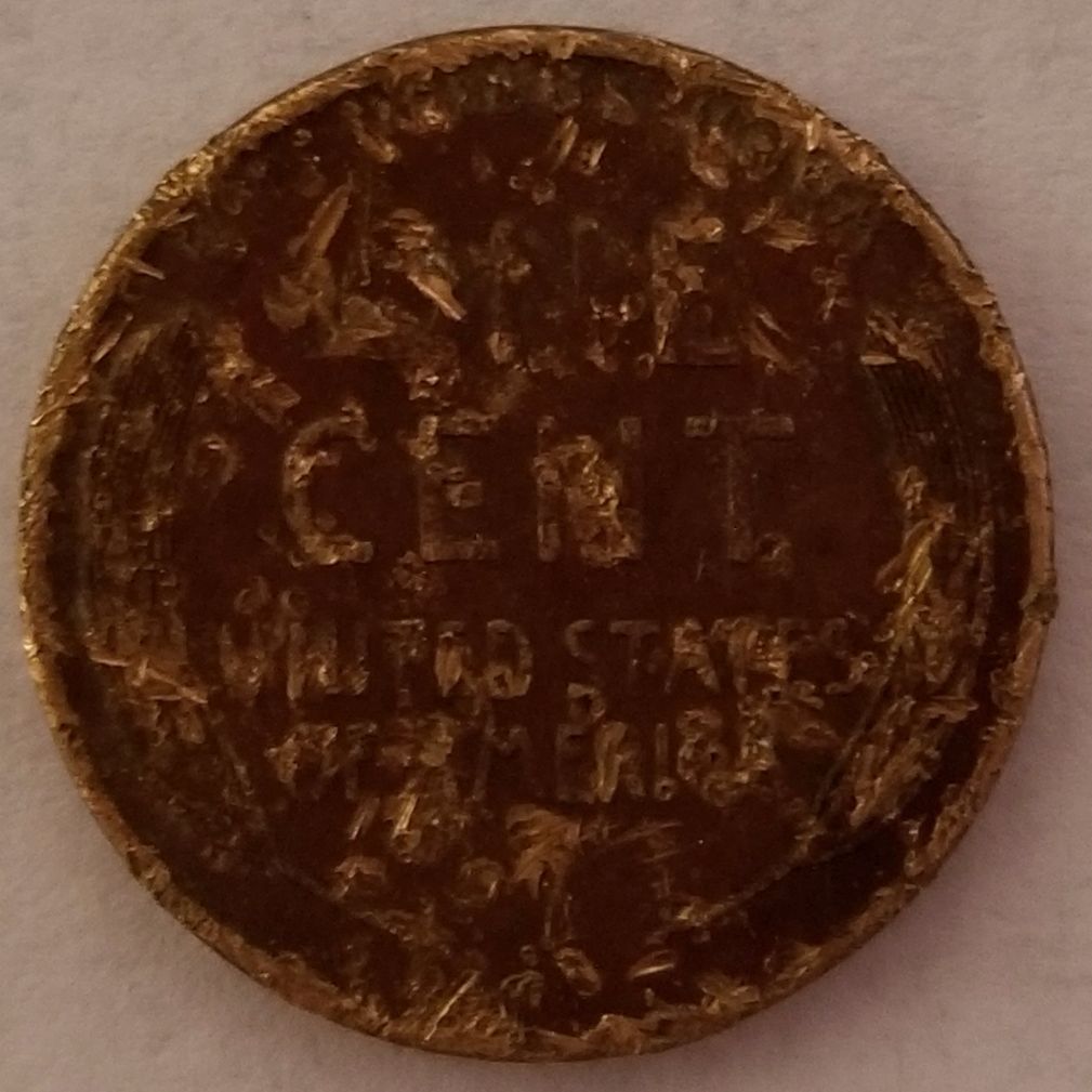 Need-Help-With-1955-Double-Punched-Penny?-And-Not-Sure-Of-Second-Penny-Year