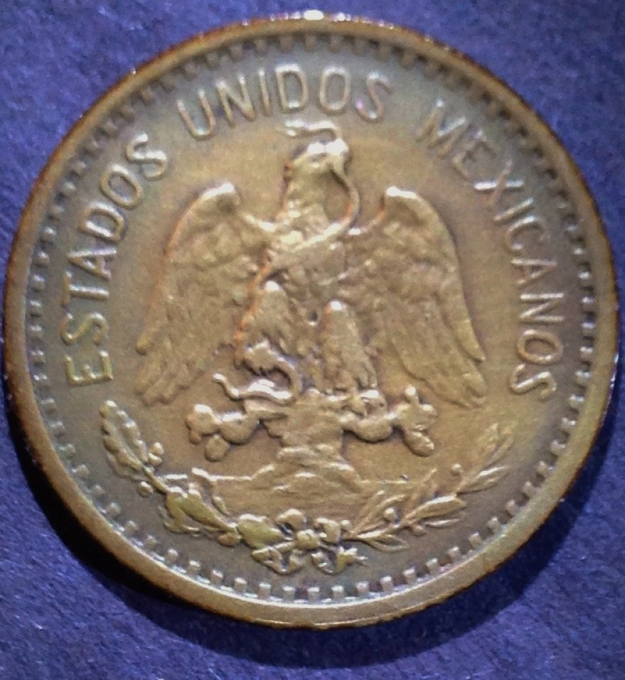 Bronze-Centavo-In-Hand-Toning-Not-Photographing