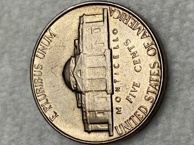 Roll-Hunting-And-Found-A-Keeper.-1959-Nickel