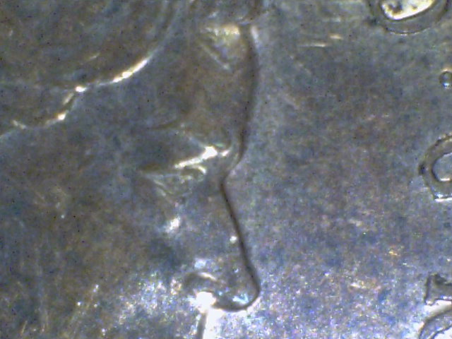 1999-Qe2-Cat-Eye