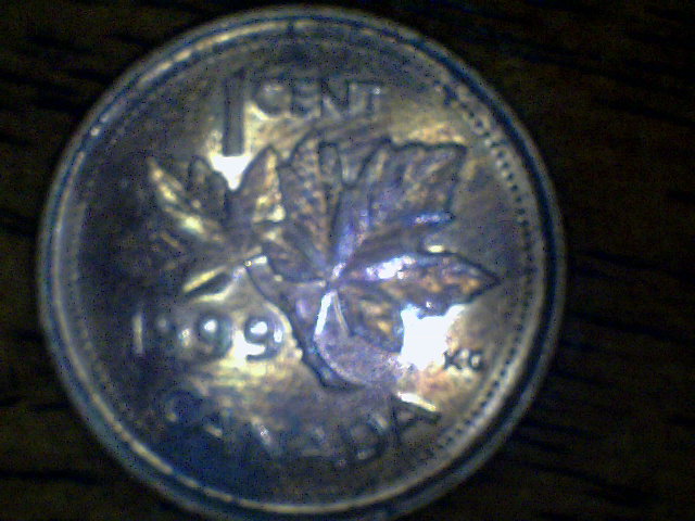 1999-Qe2-Cat-Eye