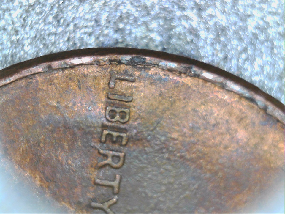 1989-D-LMC-Obverse-Looks-Cupped/Slope-Effect--I-Guess?reverse-Lettering?