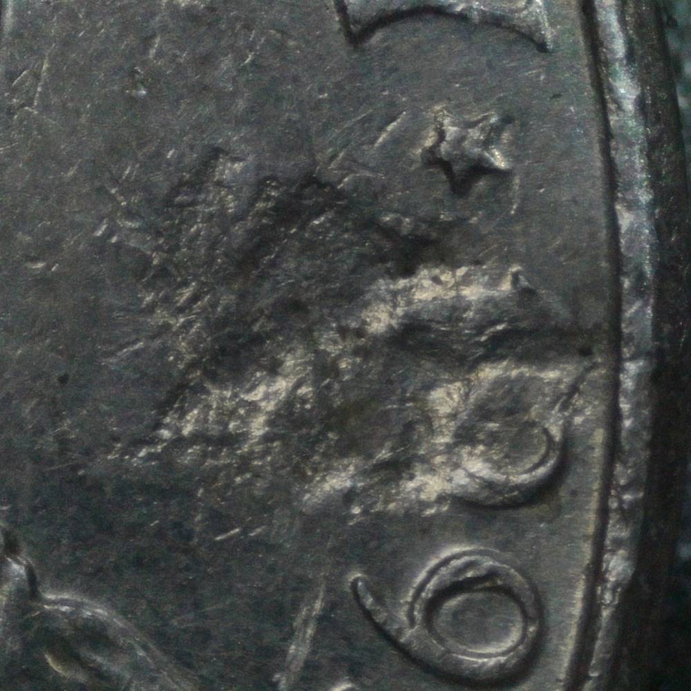 1995-P-Nickel-With-Indent:-Struck-Through-Or-PMD?