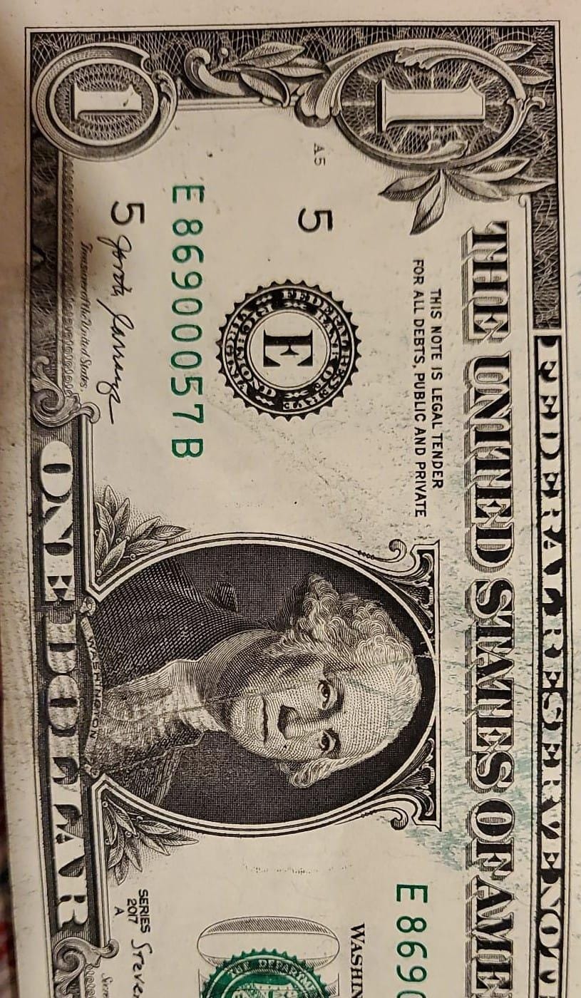 Dollar-Bill-With-Extra-Green-Ink-On-Back
